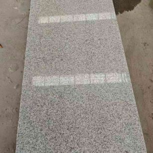 辽源芝麻白光面毛板